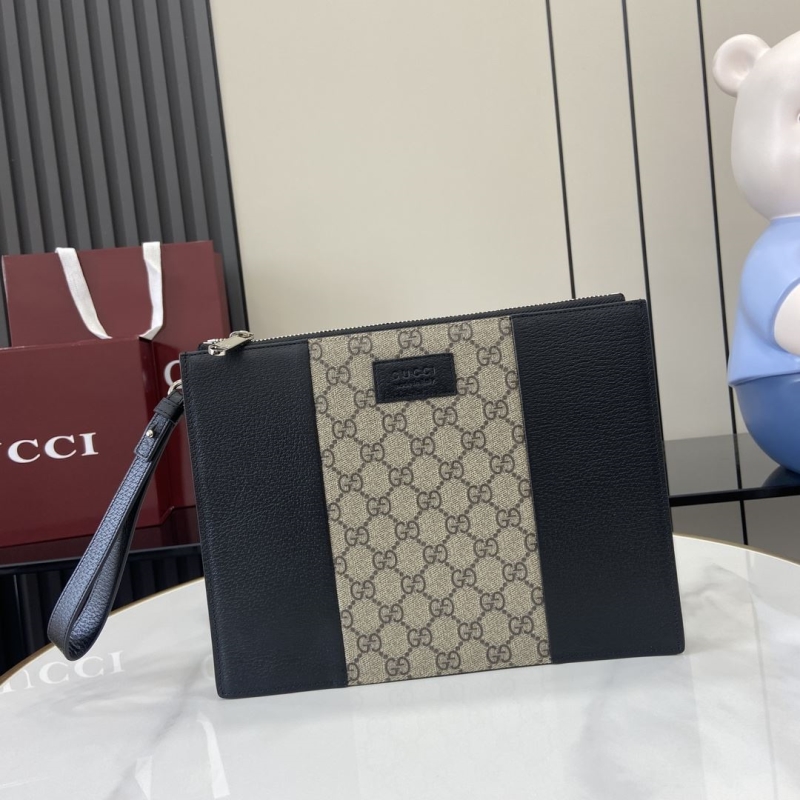 G*u*i clutch bags
